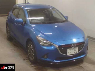 Mazda DEMIO  с аукциона в Японии