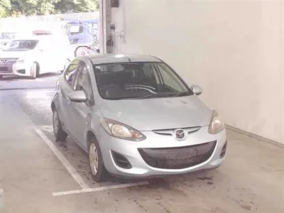 Mazda DEMIO  с аукциона в Японии