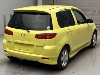 Mazda DEMIO  с аукциона в Японии