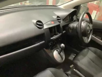 Mazda DEMIO  с аукциона в Японии