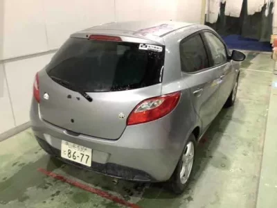 Mazda DEMIO  с аукциона в Японии