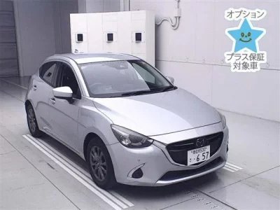 Mazda DEMIO  с аукциона в Японии