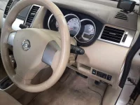 Nissan TIIDA LATIO лот № 10082 оценка 4.5  с аукциона в Японии 1