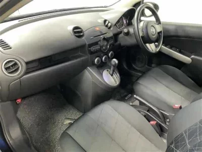 Mazda DEMIO  с аукциона в Японии