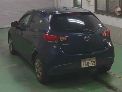 Mazda DEMIO  с аукциона в Японии