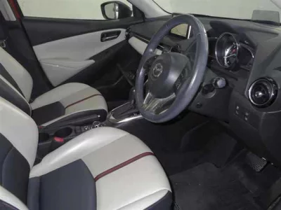 Mazda DEMIO  с аукциона в Японии