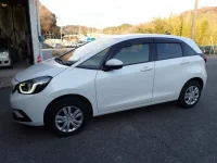 Honda FIT лот № 25011 оценка 4  с аукциона в Японии 5