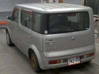 Nissan CUBECUBIC лот № 7018 оценка   с аукциона в Японии 1