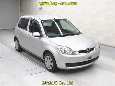 Mazda DEMIO  с аукциона в Японии