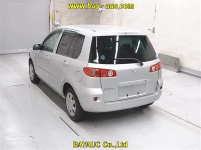 Mazda DEMIO  с аукциона в Японии