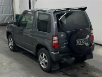 Nissan KIX лот № 10 оценка 3.5  с аукциона в Японии 1