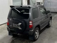 Nissan KIX лот № 10 оценка 3.5  с аукциона в Японии 4