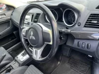 Mitsubishi LANCER лот № 20074 оценка 3.5  с аукциона в Японии 2