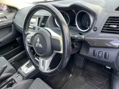 Mitsubishi LANCER  с аукциона в Японии