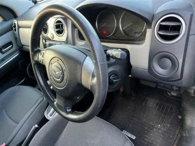 Mazda VERISA  с аукциона в Японии