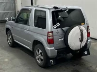 Nissan KIX лот № 97 оценка 4  с аукциона в Японии 1