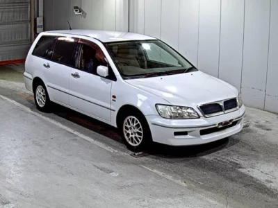 Mitsubishi LANCER  с аукциона в Японии