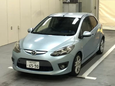 Mazda DEMIO  с аукциона в Японии