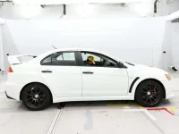 Mitsubishi LANCER лот № 36286 оценка 3.5  с аукциона в Японии 2