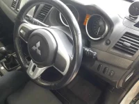 Mitsubishi LANCER лот № 36286 оценка 3.5  с аукциона в Японии 8