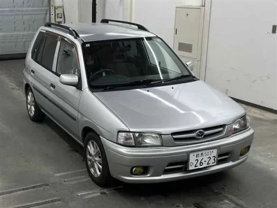 Mazda DEMIO  с аукциона в Японии