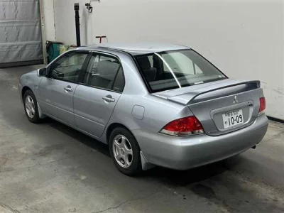 Mitsubishi LANCER  с аукциона в Японии