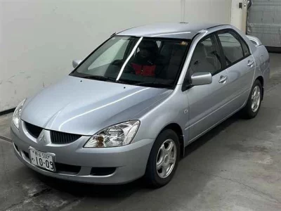 Mitsubishi LANCER  с аукциона в Японии