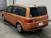 Nissan LAFESTA лот № 90005 оценка 3.5  с аукциона в Японии 1