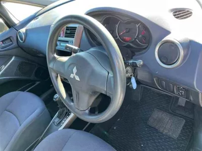 Mitsubishi COLT PLUS  с аукциона в Японии