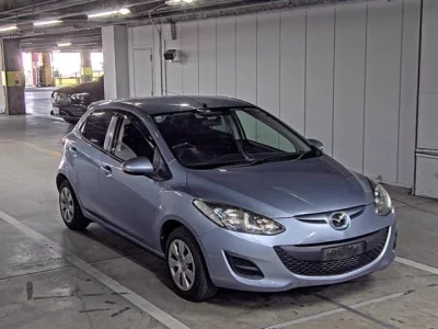 Mazda DEMIO  с аукциона в Японии