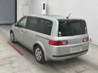 Nissan LAFESTA лот № 90091 оценка 4  с аукциона в Японии 1