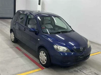 Mazda DEMIO  с аукциона в Японии