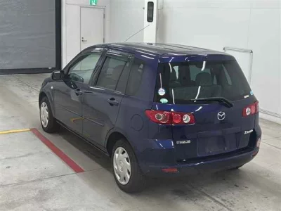Mazda DEMIO  с аукциона в Японии