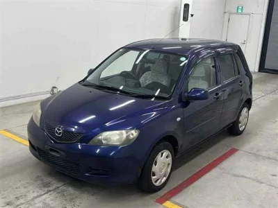 Mazda DEMIO  с аукциона в Японии