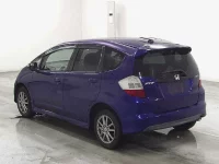 Honda FIT лот № 7046 оценка 3.5  с аукциона в Японии 1