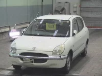 Toyota DUET лот № 7038 оценка 3.5  с аукциона в Японии 2