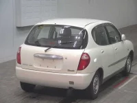 Toyota DUET лот № 7038 оценка 3.5  с аукциона в Японии 3