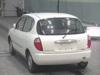 Toyota DUET лот № 7038 оценка 3.5  с аукциона в Японии 1