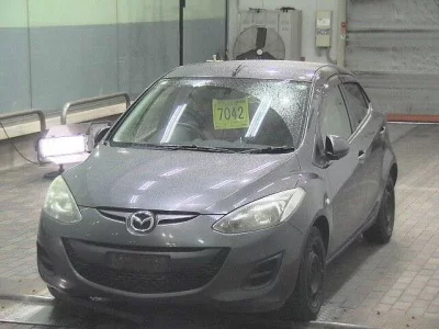 Mazda DEMIO  с аукциона в Японии