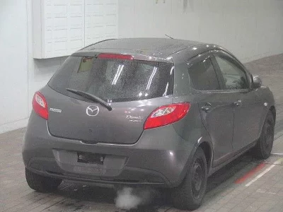 Mazda DEMIO  с аукциона в Японии