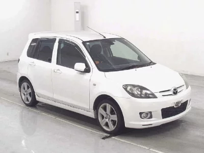 Mazda DEMIO  с аукциона в Японии