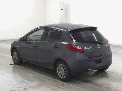 Mazda DEMIO  с аукциона в Японии