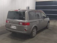 Nissan LAFESTA лот № 1091 оценка 3.5  с аукциона в Японии 4