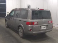 Nissan LAFESTA лот № 1091 оценка 3.5  с аукциона в Японии 1