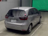 Honda FIT лот № 6104 оценка 4  с аукциона в Японии 3