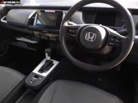 Honda FIT лот № 6104 оценка 4  с аукциона в Японии 5