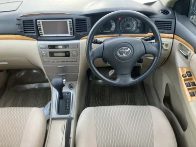 Toyota COROLLA RUNX  с аукциона в Японии