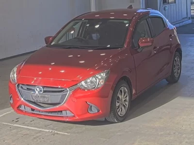 Mazda DEMIO  с аукциона в Японии