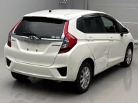 Honda FIT лот № 49007 оценка RA  с аукциона в Японии 1