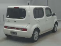 Nissan CUBE лот № 77055 оценка 3.5  с аукциона в Японии 1